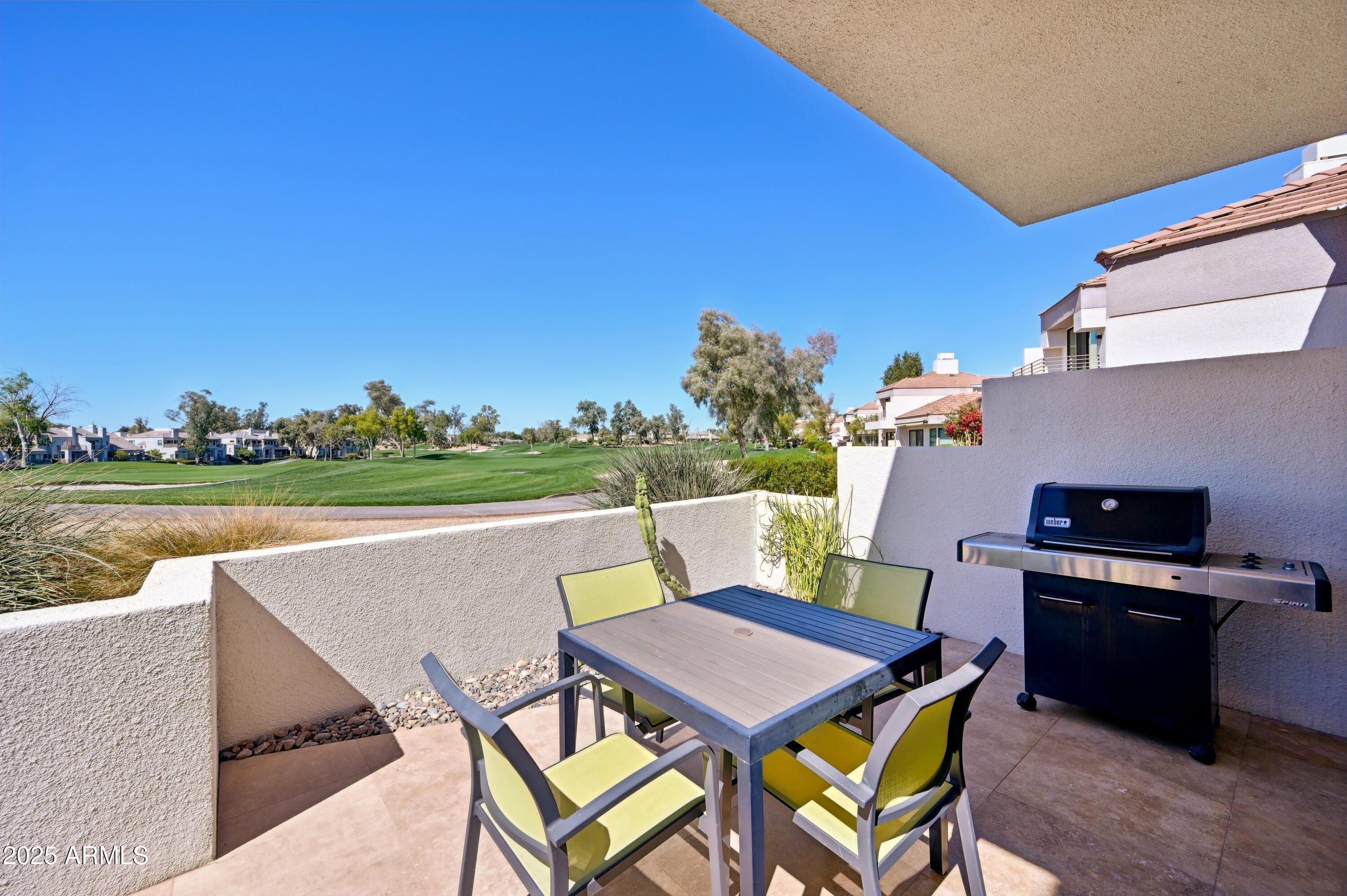 7222 East Gainey Ranch Road, Unit 142 Scottsdale, AZ 85258 - Photo 41 of 45 Patio with a view