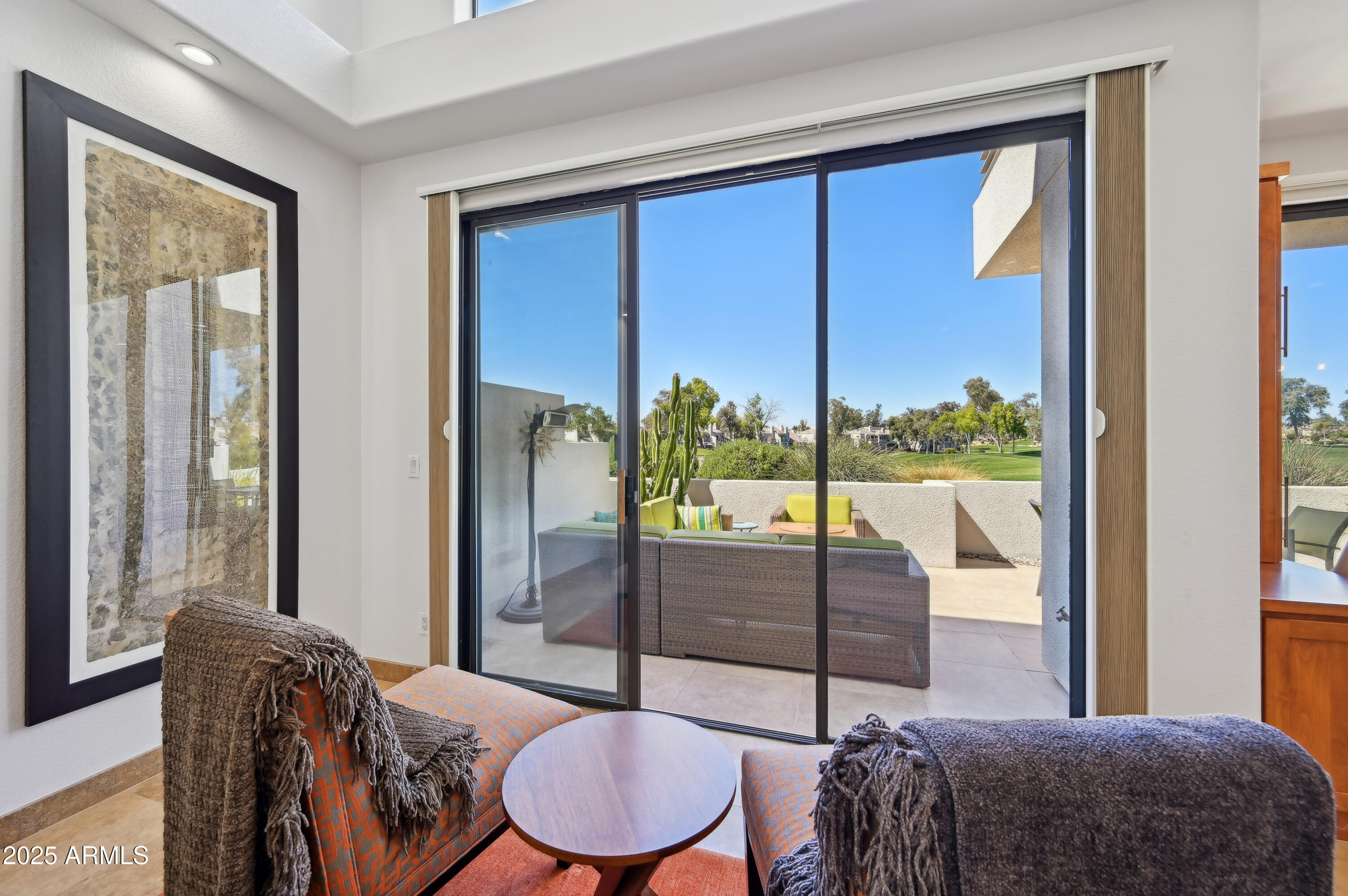 7222 East Gainey Ranch Road, Unit 142 Scottsdale, AZ 85258 - Photo 7 of 45 Living area slider to patio