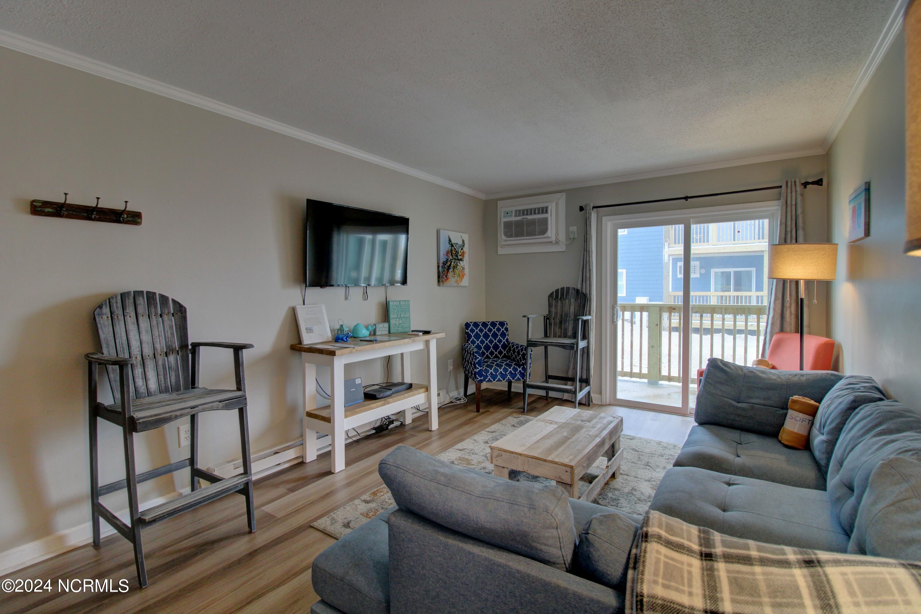 2240 New River Inlet Road, Unit 130 North Topsail Beach, NC 28460 - Photo 4 of 25 Living Room