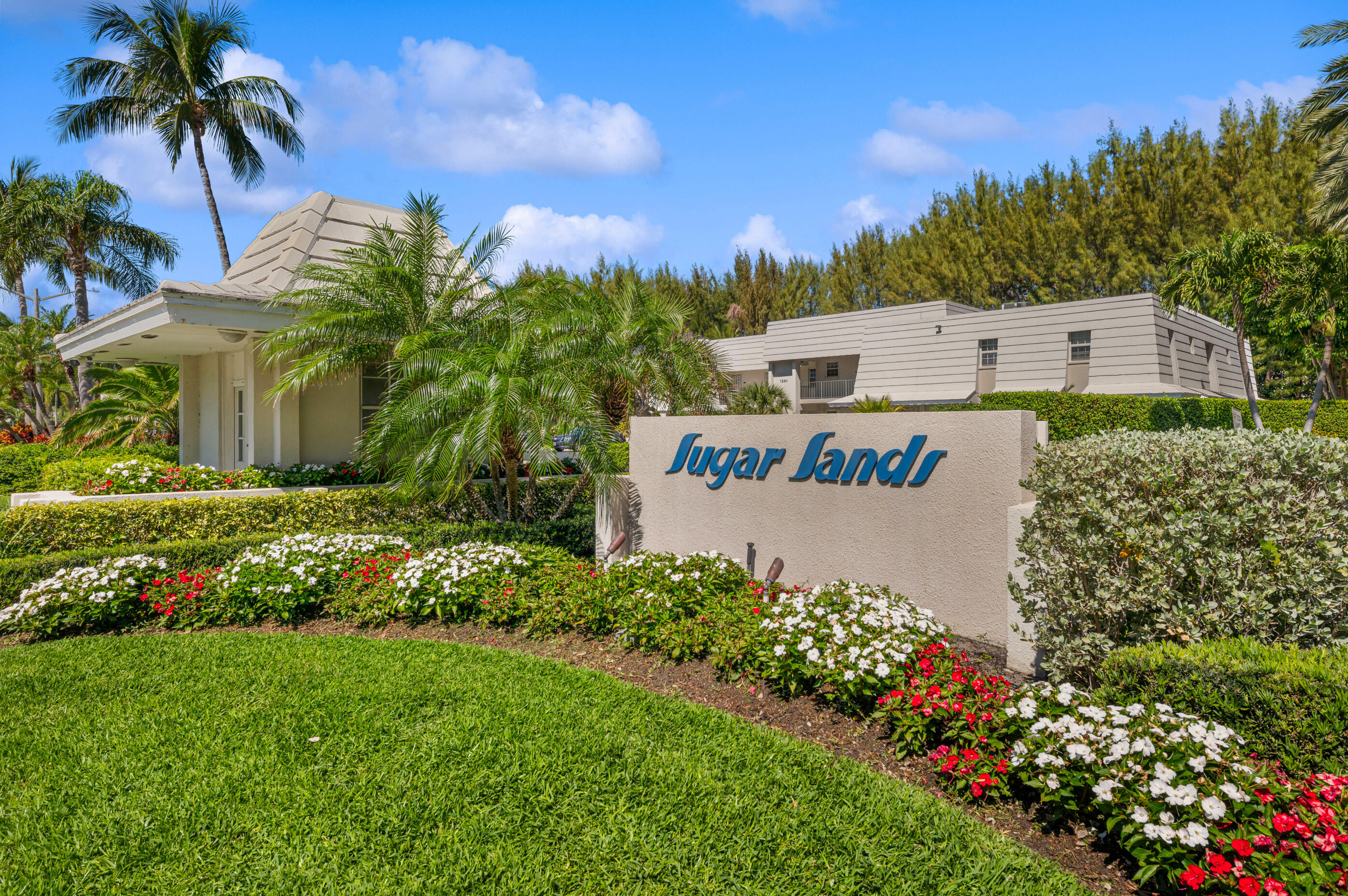 1201 Sugar Sands Boulevard, Unit 8 Riviera Beach, FL 33404 - Photo 1 of 9 community entrance