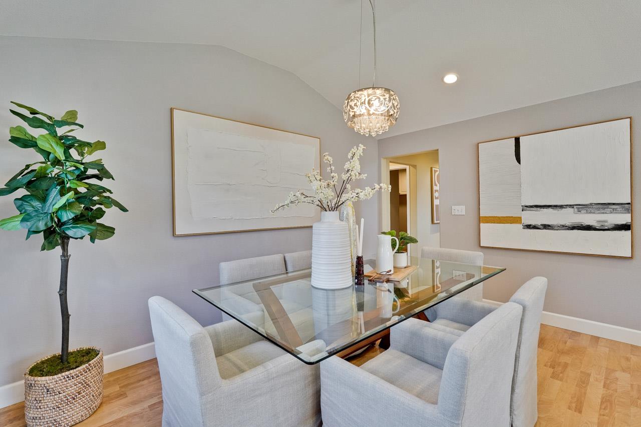 942 September Drive Cupertino, CA 95014 - Photo 11 of 51 a view of a dining room with furniture a chandelier and wooden floor