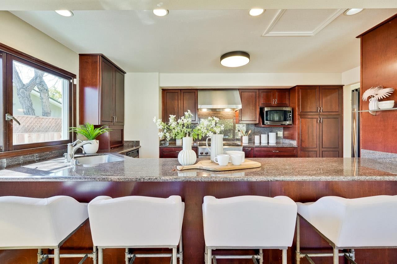 942 September Drive Cupertino, CA 95014 - Photo 20 of 51 a dining room with furniture and wooden floor