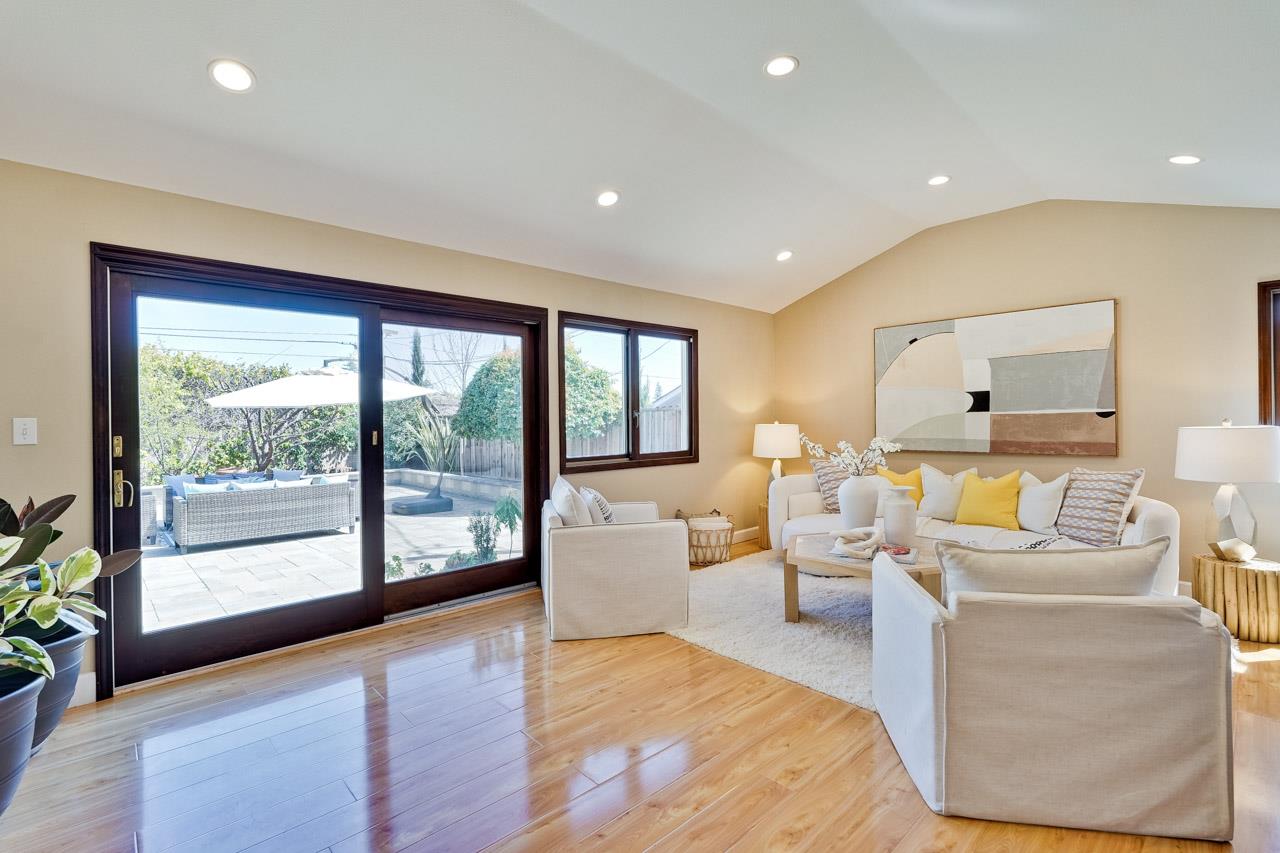 942 September Drive Cupertino, CA 95014 - Photo 22 of 51 a living room with furniture and a large window