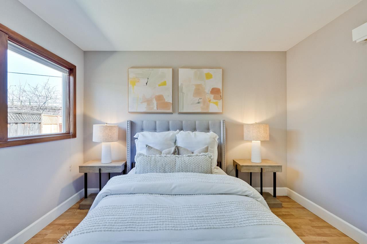942 September Drive Cupertino, CA 95014 - Photo 25 of 51 a bedroom with a bed and a night stand