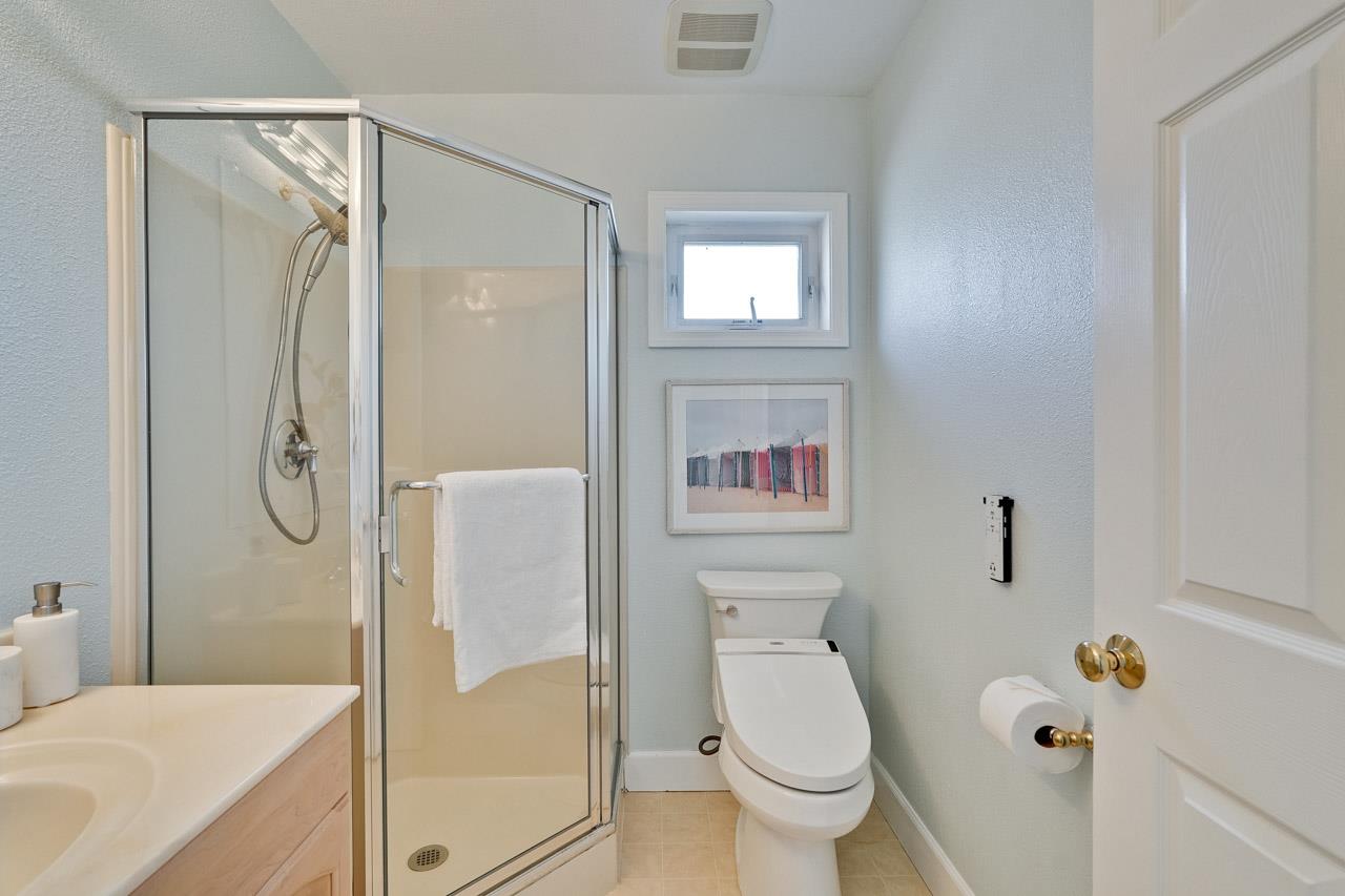 942 September Drive Cupertino, CA 95014 - Photo 28 of 51 a bathroom with a shower a toilet and a sink