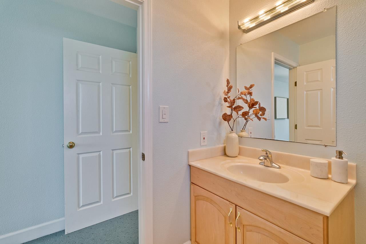 942 September Drive Cupertino, CA 95014 - Photo 29 of 51 a bathroom with a sink and a mirror