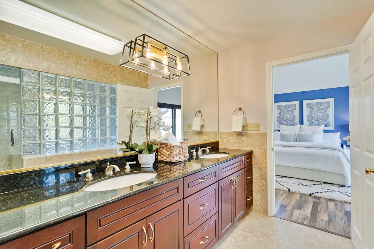 942 September Drive Cupertino, CA 95014 - Photo 34 of 51 a large kitchen with granite countertop a lot of counter space and a sink