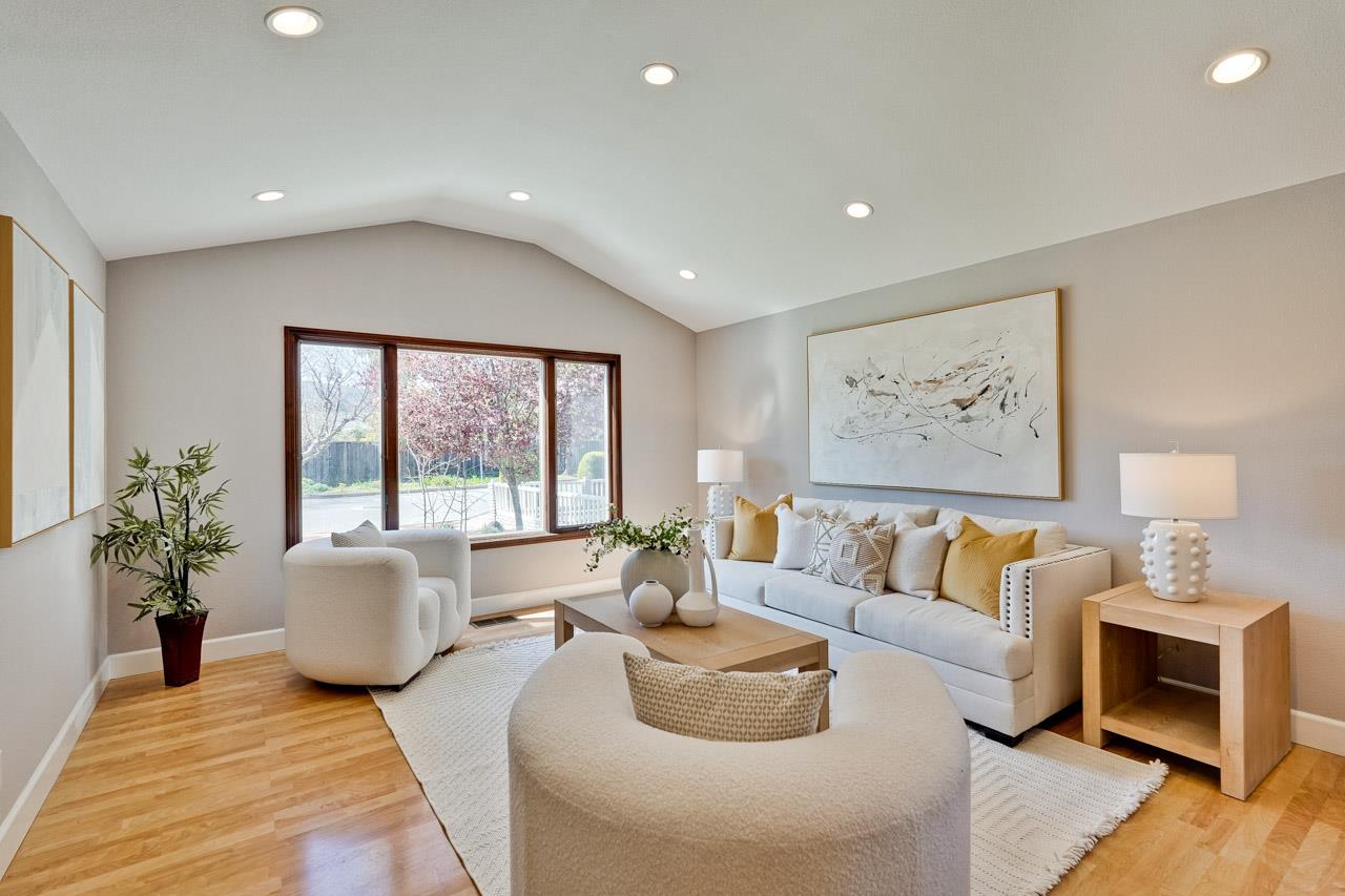 942 September Drive Cupertino, CA 95014 - Photo 4 of 51 a living room with furniture and a large window