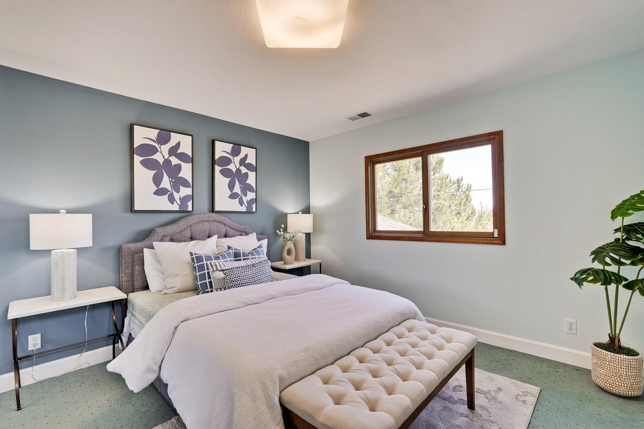 942 September Drive Cupertino, CA 95014 - Photo 42 of 51 a bedroom with a bed and a potted plant