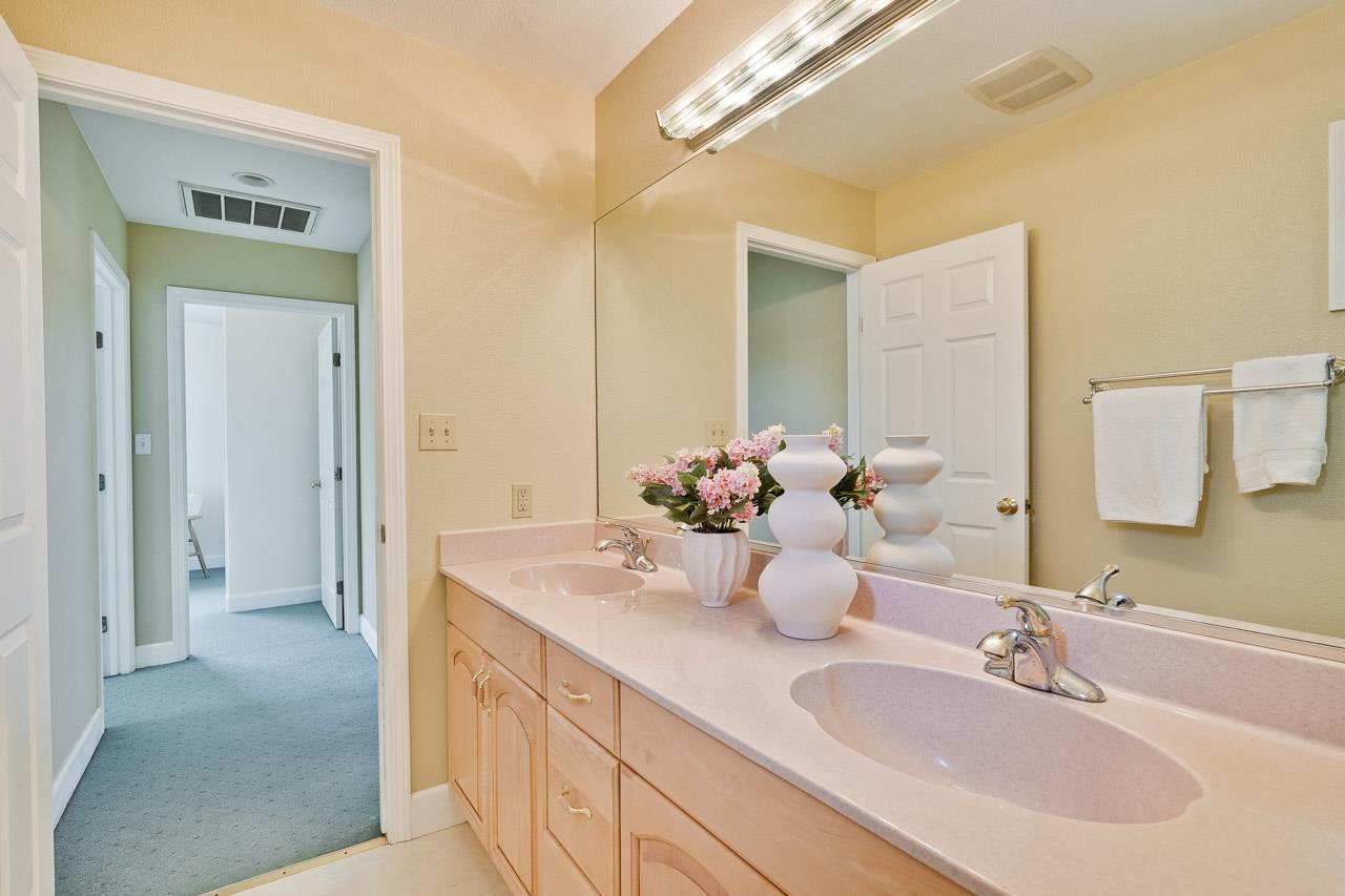 942 September Drive Cupertino, CA 95014 - Photo 43 of 51 a bathroom with a sink and a mirror