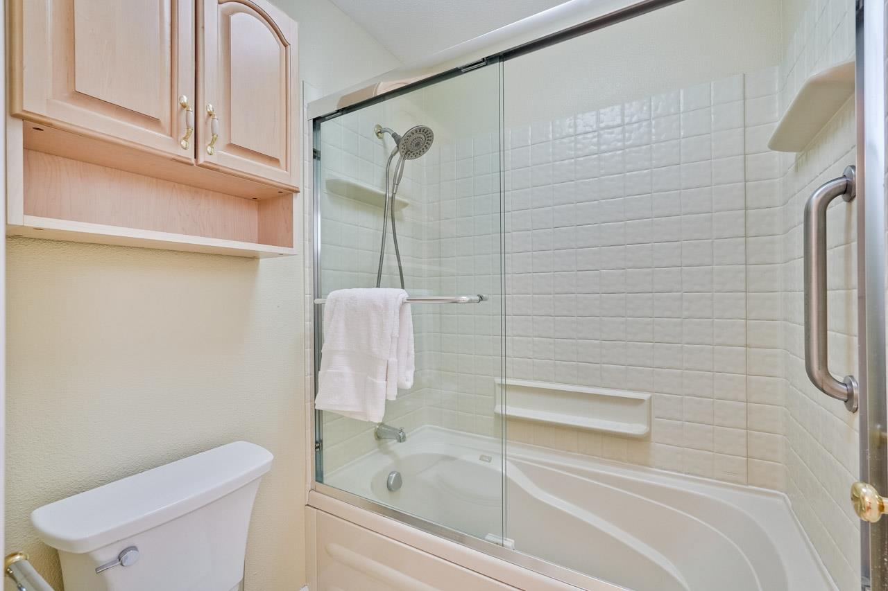 942 September Drive Cupertino, CA 95014 - Photo 44 of 51 a bathroom with a shower and toilet