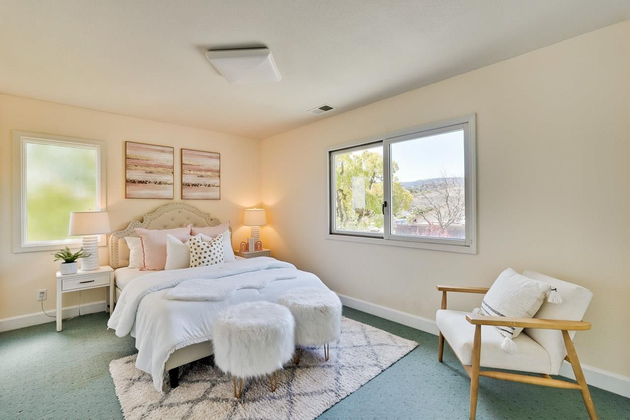 942 September Drive Cupertino, CA 95014 - Photo 45 of 51 a bedroom with a bed and chair