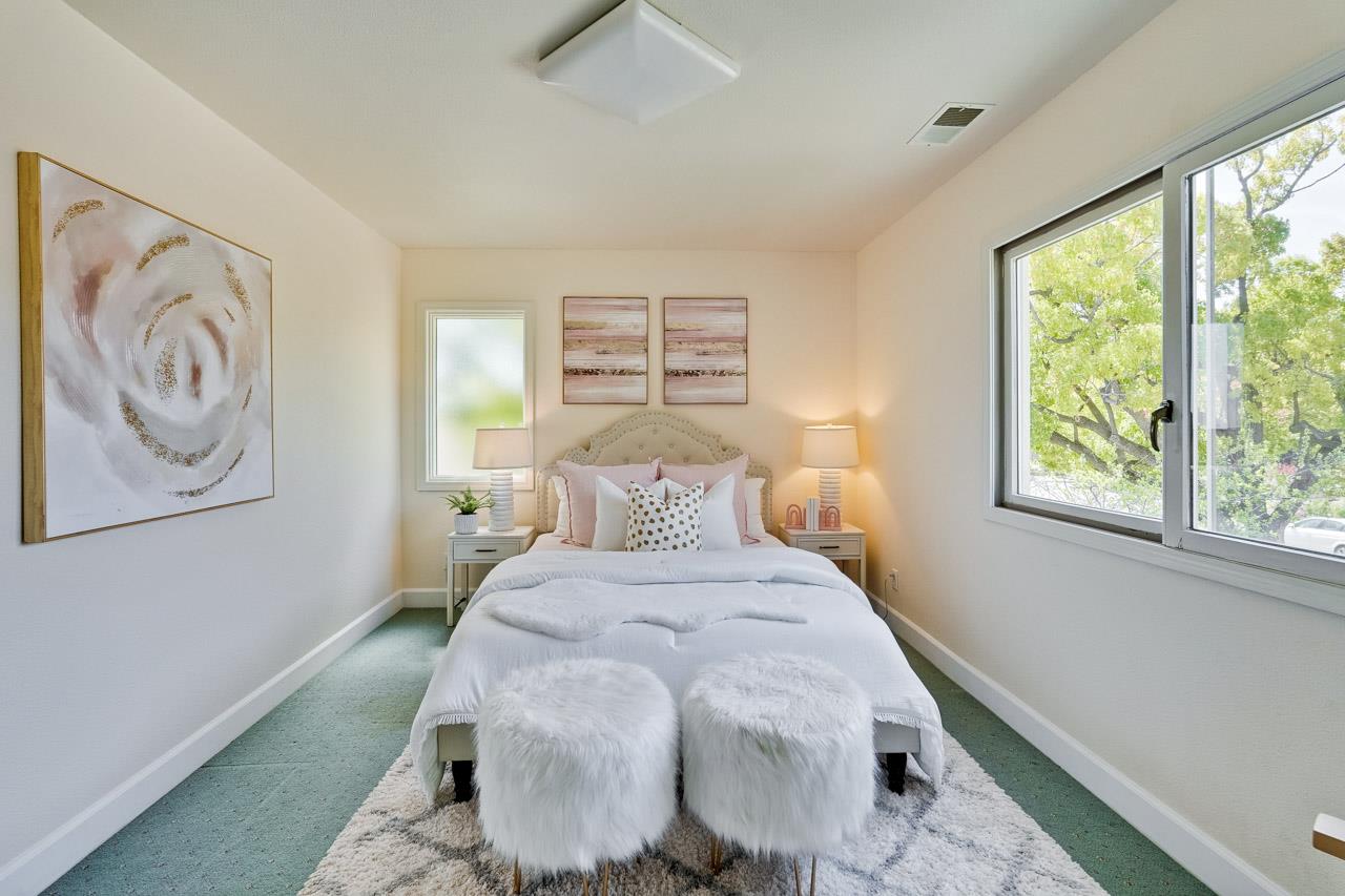 942 September Drive Cupertino, CA 95014 - Photo 46 of 51 a bedroom with a large bed and a window