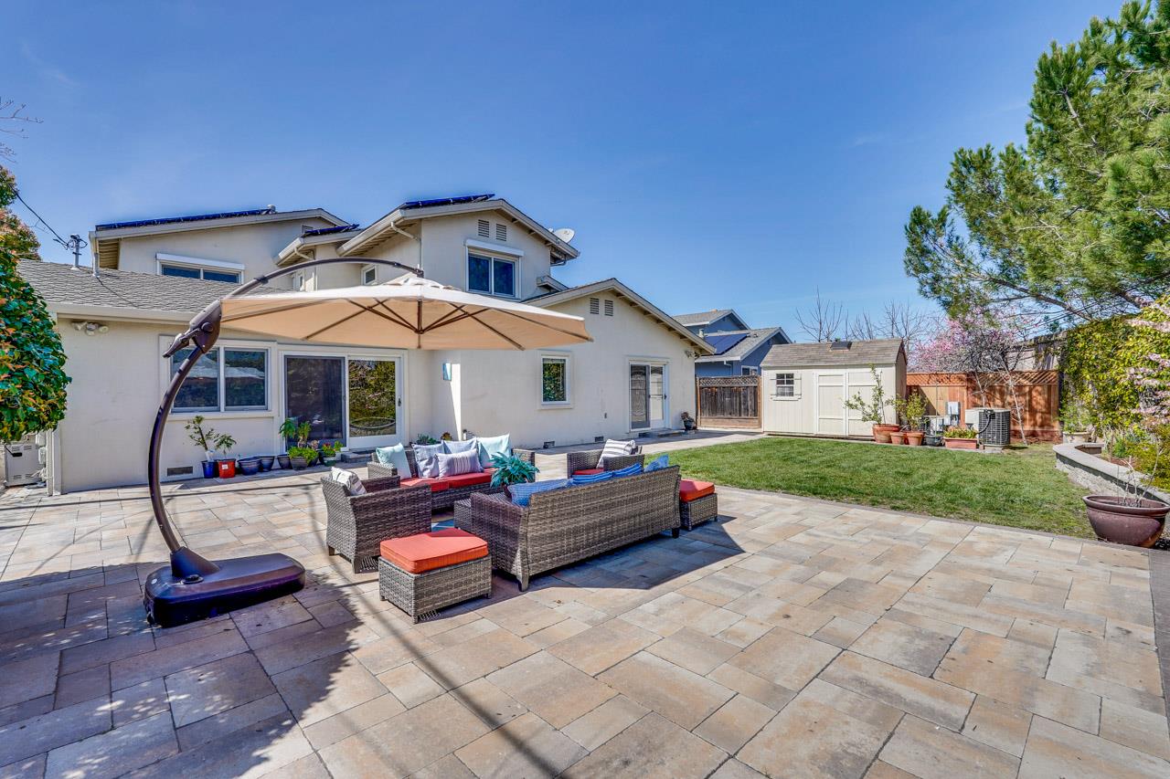 942 September Drive Cupertino, CA 95014 - Photo 49 of 51 a view of a house with backyard and sitting area