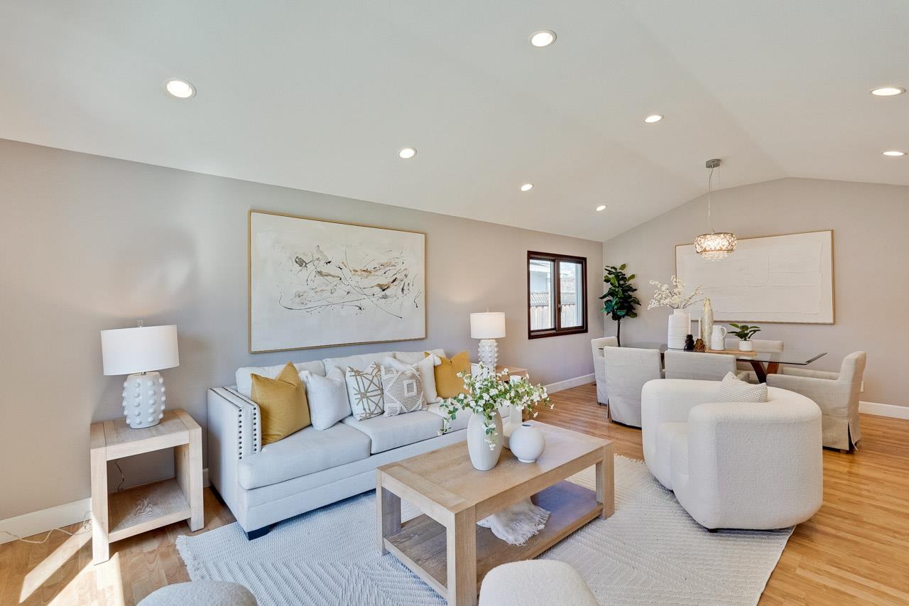 942 September Drive Cupertino, CA 95014 - Photo 6 of 51 a living room with furniture and a painting