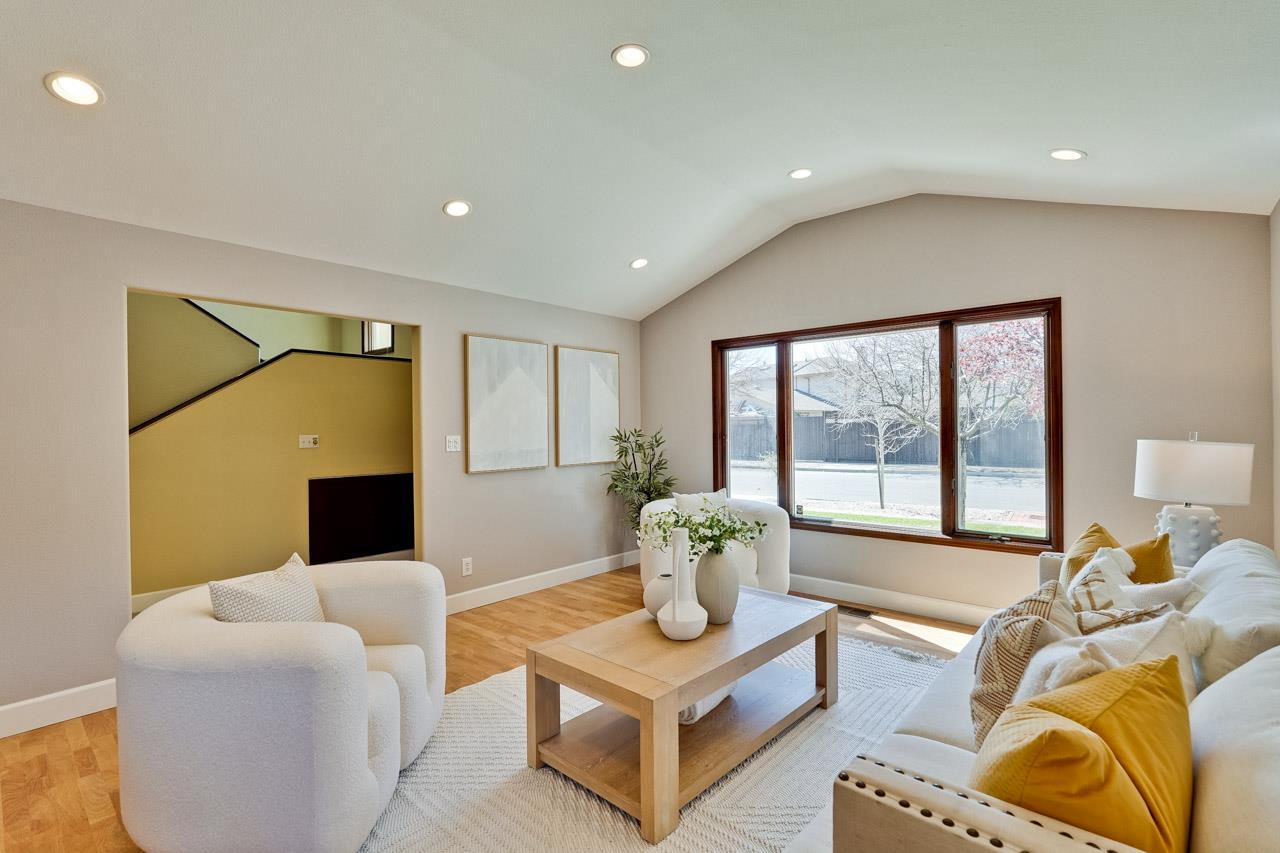 942 September Drive Cupertino, CA 95014 - Photo 7 of 51 a living room with furniture and a large window