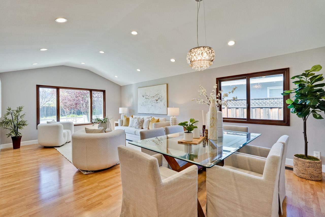942 September Drive Cupertino, CA 95014 - Photo 10 of 51 a living room with fireplace furniture and a large window