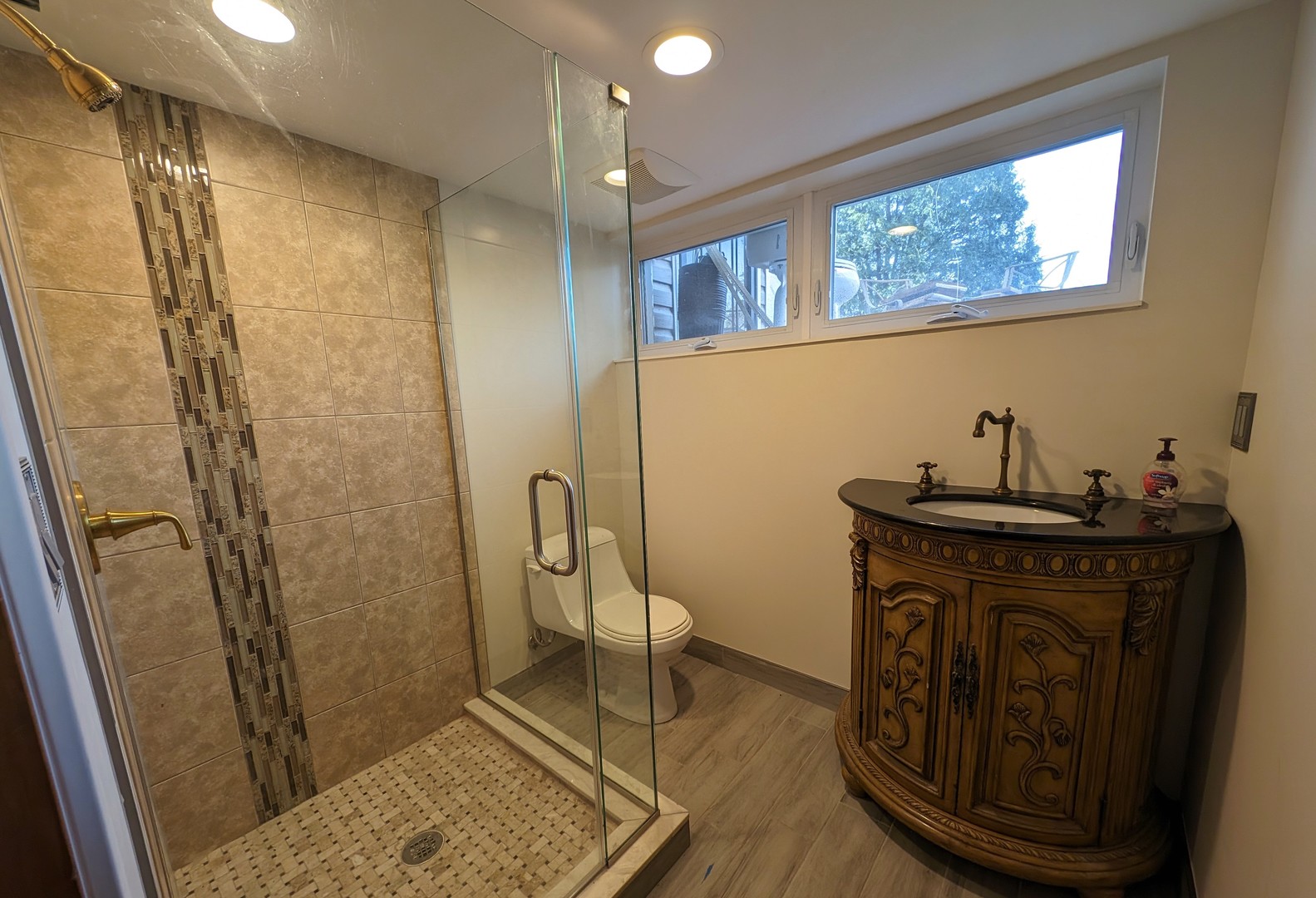 726 South Naperville Road Wheaton, IL 60187 - Photo 17 of 28 a view of a bathroom with a sink and a mirror