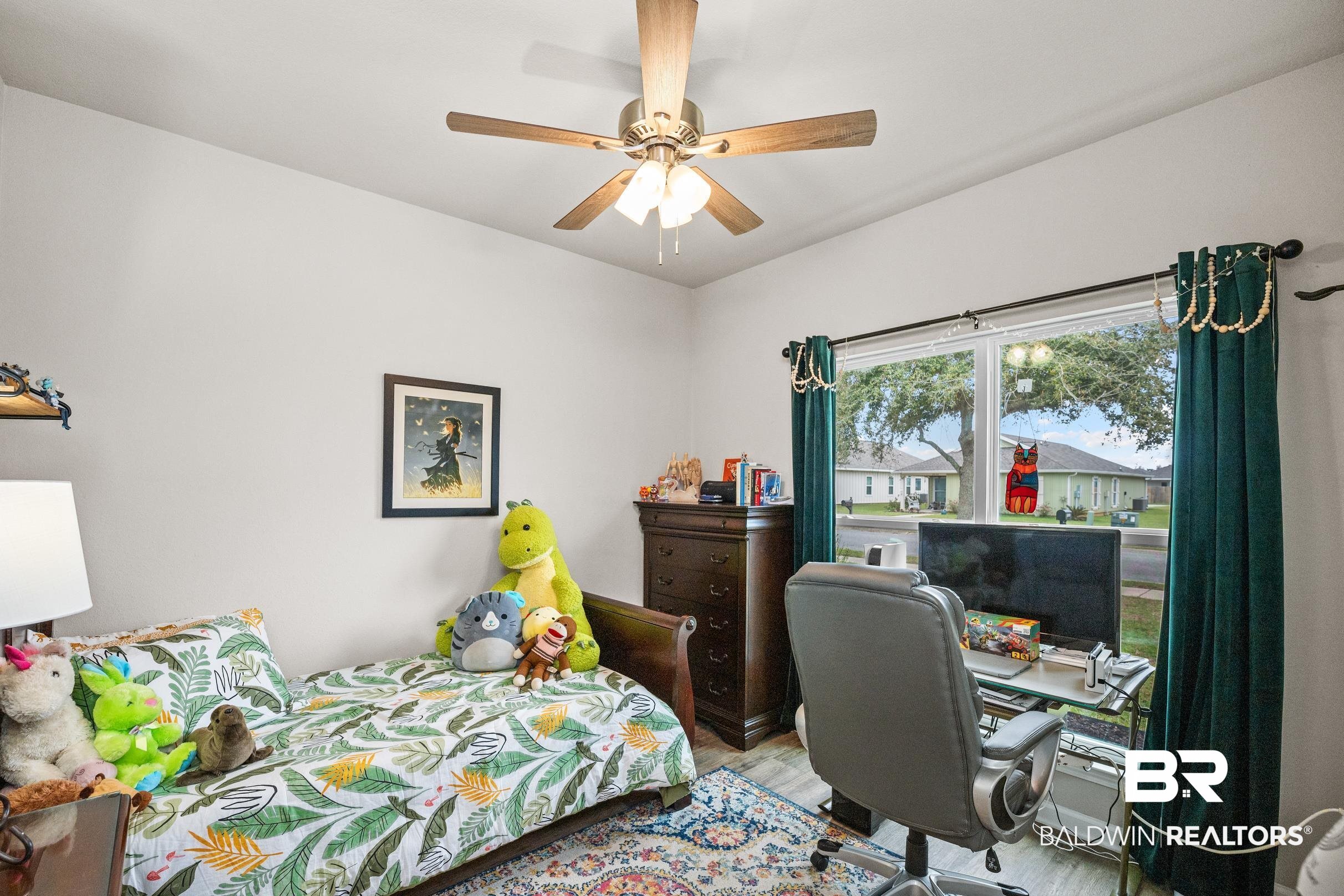 24139 Veranda Circle Elberta, AL 36530 - Photo 25 of 40 Bedroom featuring a ceiling fan and wood finished floors