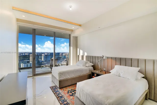 an entryway with a rug