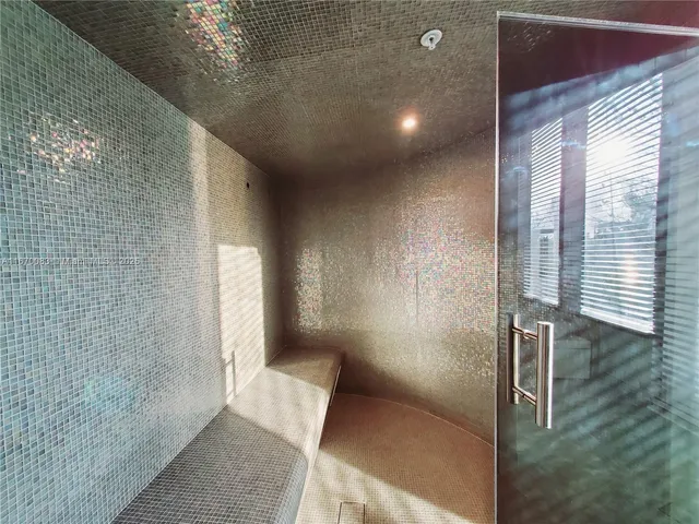 a view of swimming pool with outdoor seating