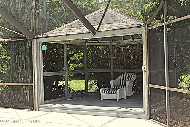 a view of a balcony with door