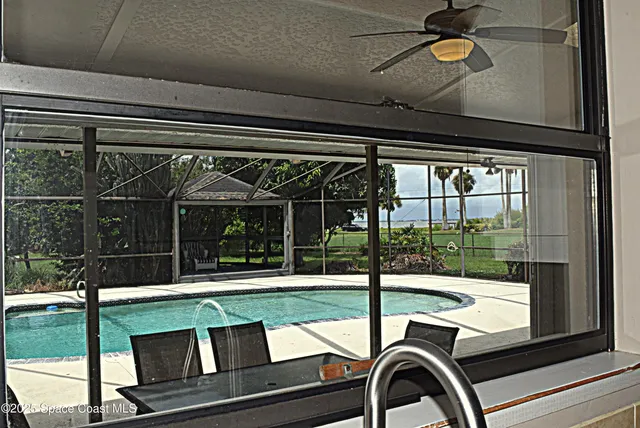 a view of a porch and a yard