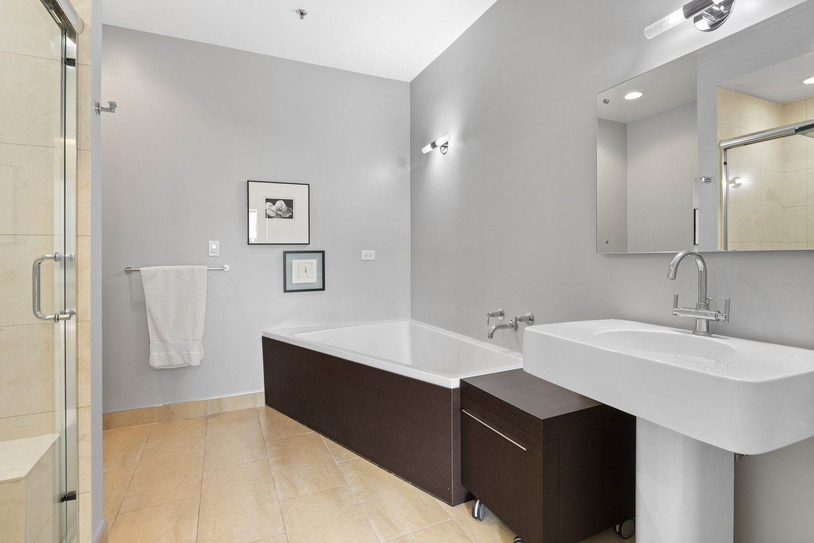 1800 Ridge Avenue, Unit 102 Evanston, IL 60201 - Photo 21 of 26 a bathroom with a sink and a mirror