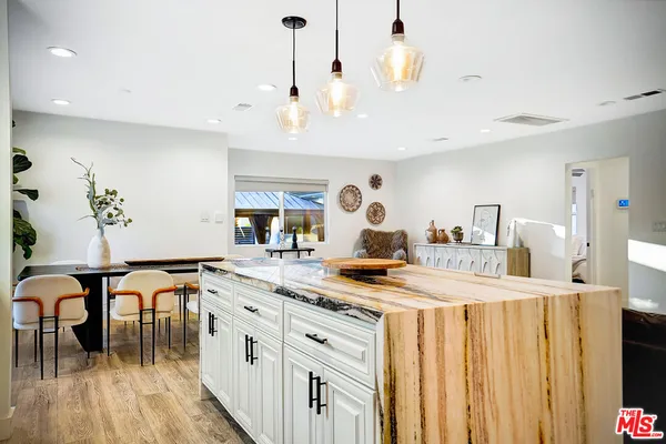 a living room with furniture fireplace and lamp