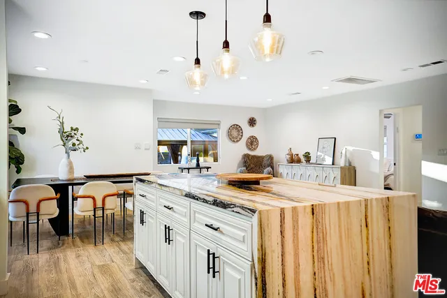 a living room with furniture fireplace and lamp
