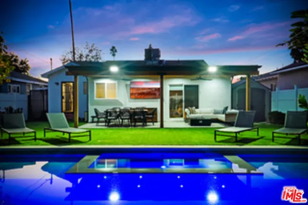 a living room with furniture and a yard