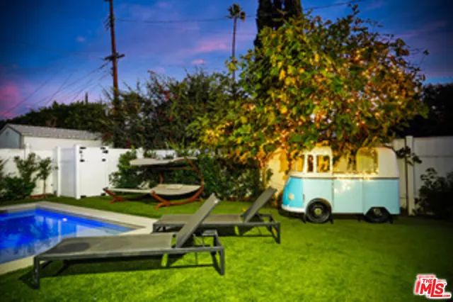 a spacious bathroom with a bathtub and a toilet