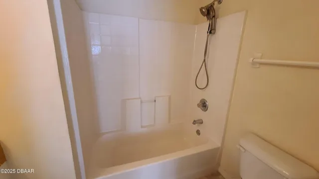 a view of backyard with green space