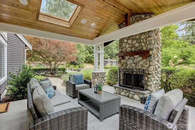 a outdoor living space with furniture and garden view