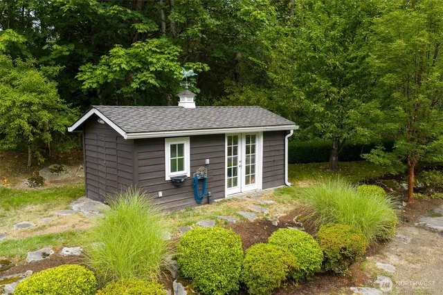a view of a backyard of the house