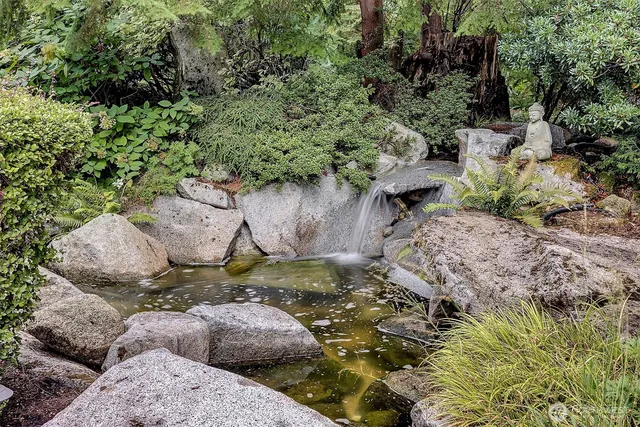 a view of a garden with patio