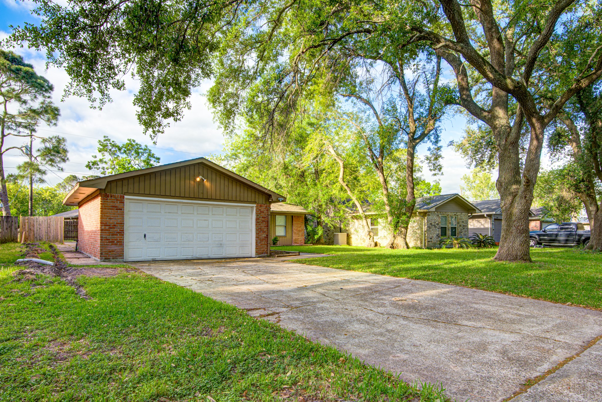 828 Noreda Street Angleton, TX 77515 - Photo 5 of 28 a front view of house with yard and green space