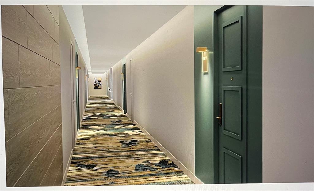 1000 South Ocean Boulevard, Unit 11K Pompano Beach, FL 33062 - Photo 25 of 25 a view of a hallway with wooden floor and staircase