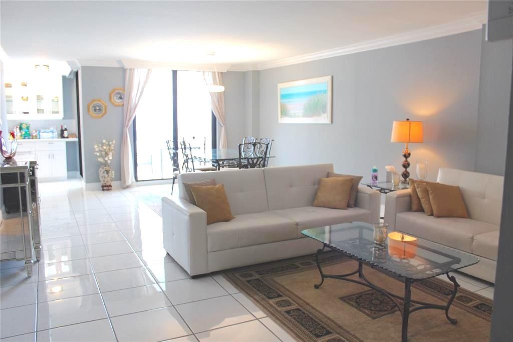 1000 South Ocean Boulevard, Unit 11K Pompano Beach, FL 33062 - Photo 4 of 25 a living room with furniture and a couch