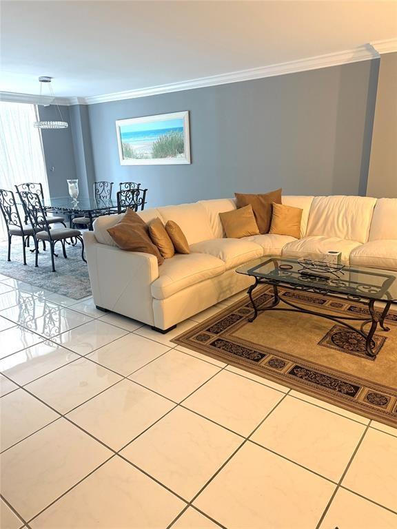1000 South Ocean Boulevard, Unit 11K Pompano Beach, FL 33062 - Photo 6 of 25 a living room with a couch and a coffee table