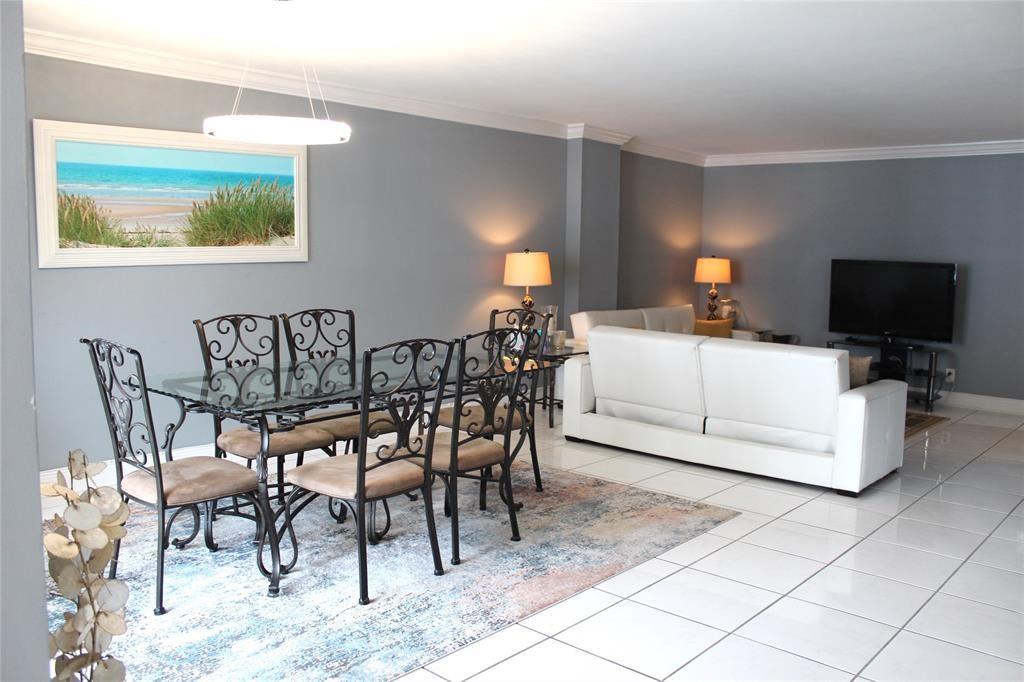 1000 South Ocean Boulevard, Unit 11K Pompano Beach, FL 33062 - Photo 8 of 25 a bedroom with a bed and a flat screen tv