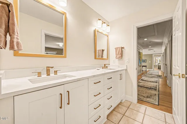 a front view of house with a garden and patio