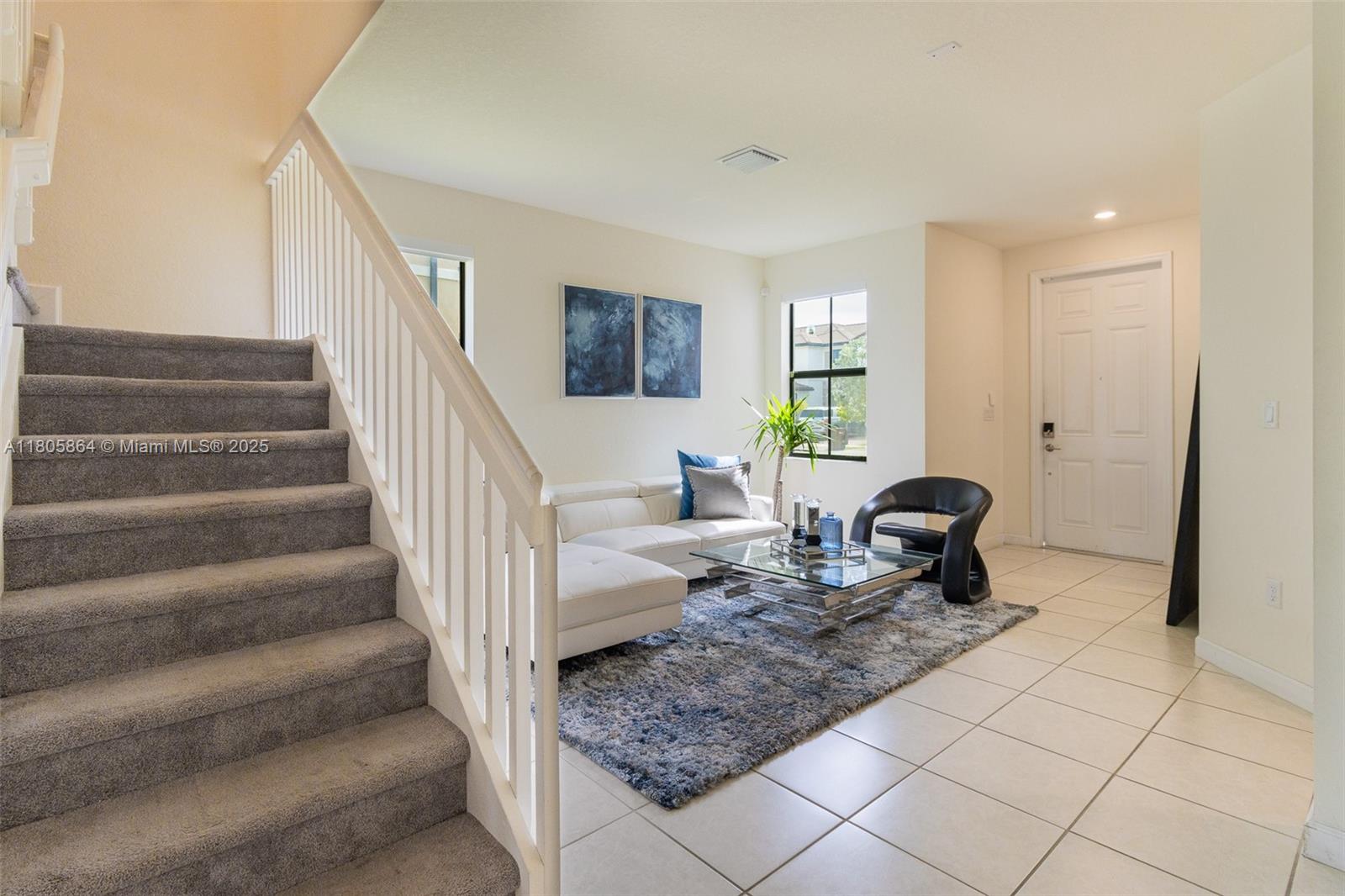 10966 West 33rd Way Hialeah, FL 33018 - Photo 12 of 43 a living room with furniture
