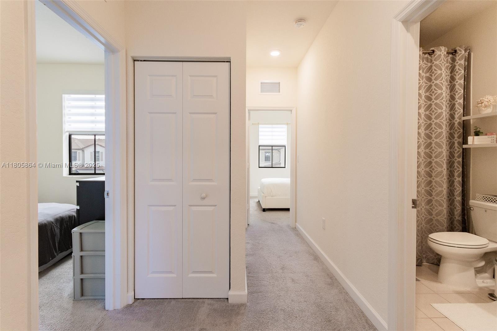 10966 West 33rd Way Hialeah, FL 33018 - Photo 24 of 43 a bathroom with a granite countertop sink a toilet and shower