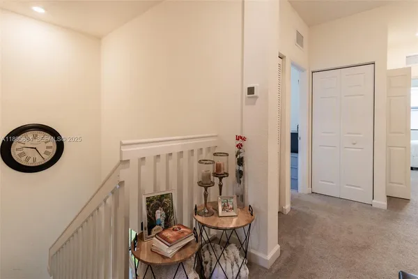 a view of a hallway with entryway