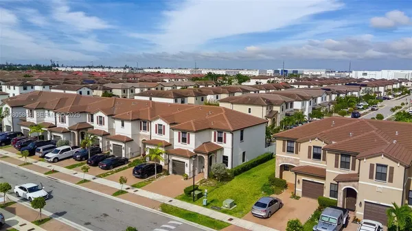 an aerial view of multiple houses