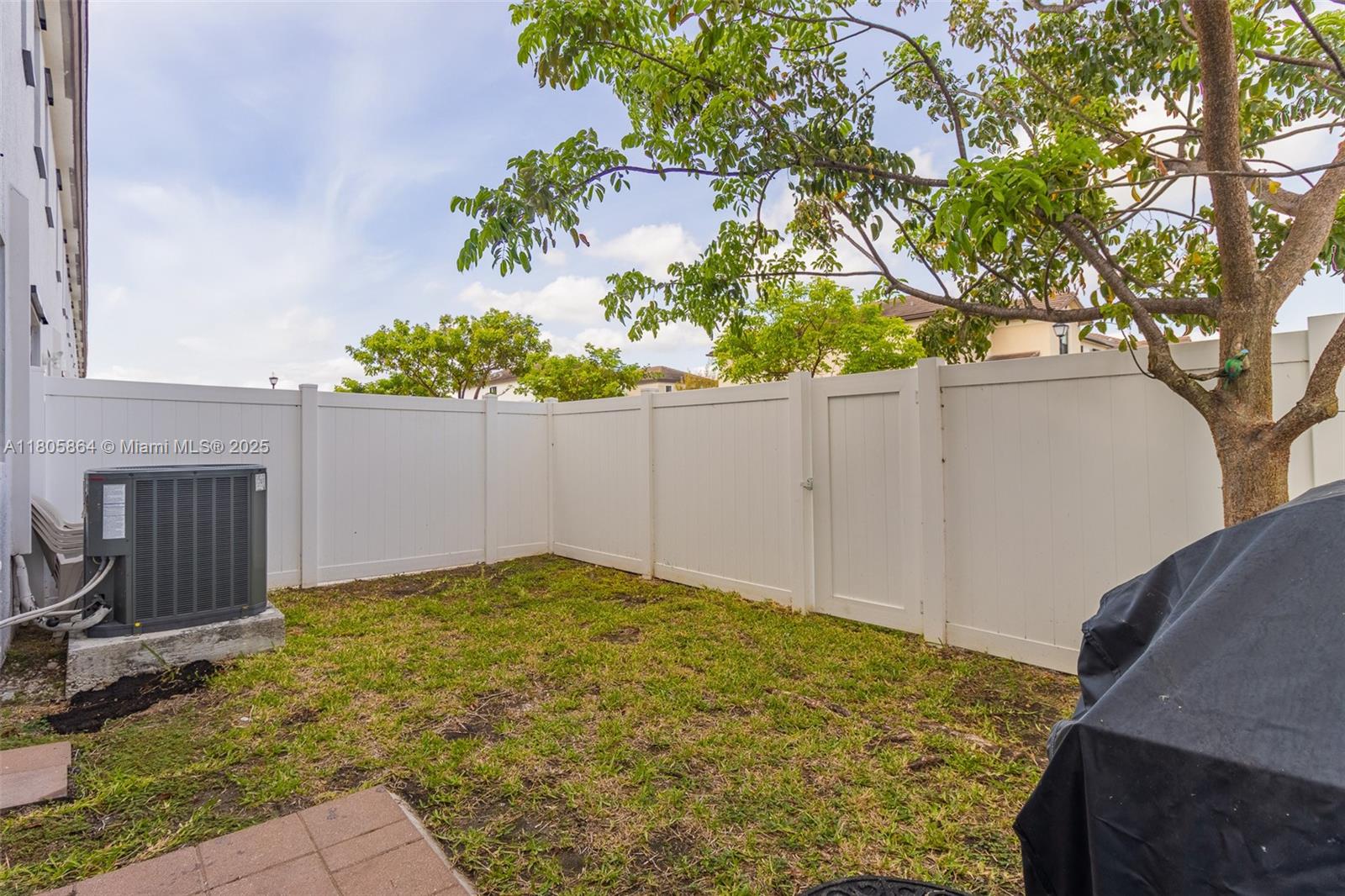 10966 West 33rd Way Hialeah, FL 33018 - Photo 5 of 43 a view of a backyard