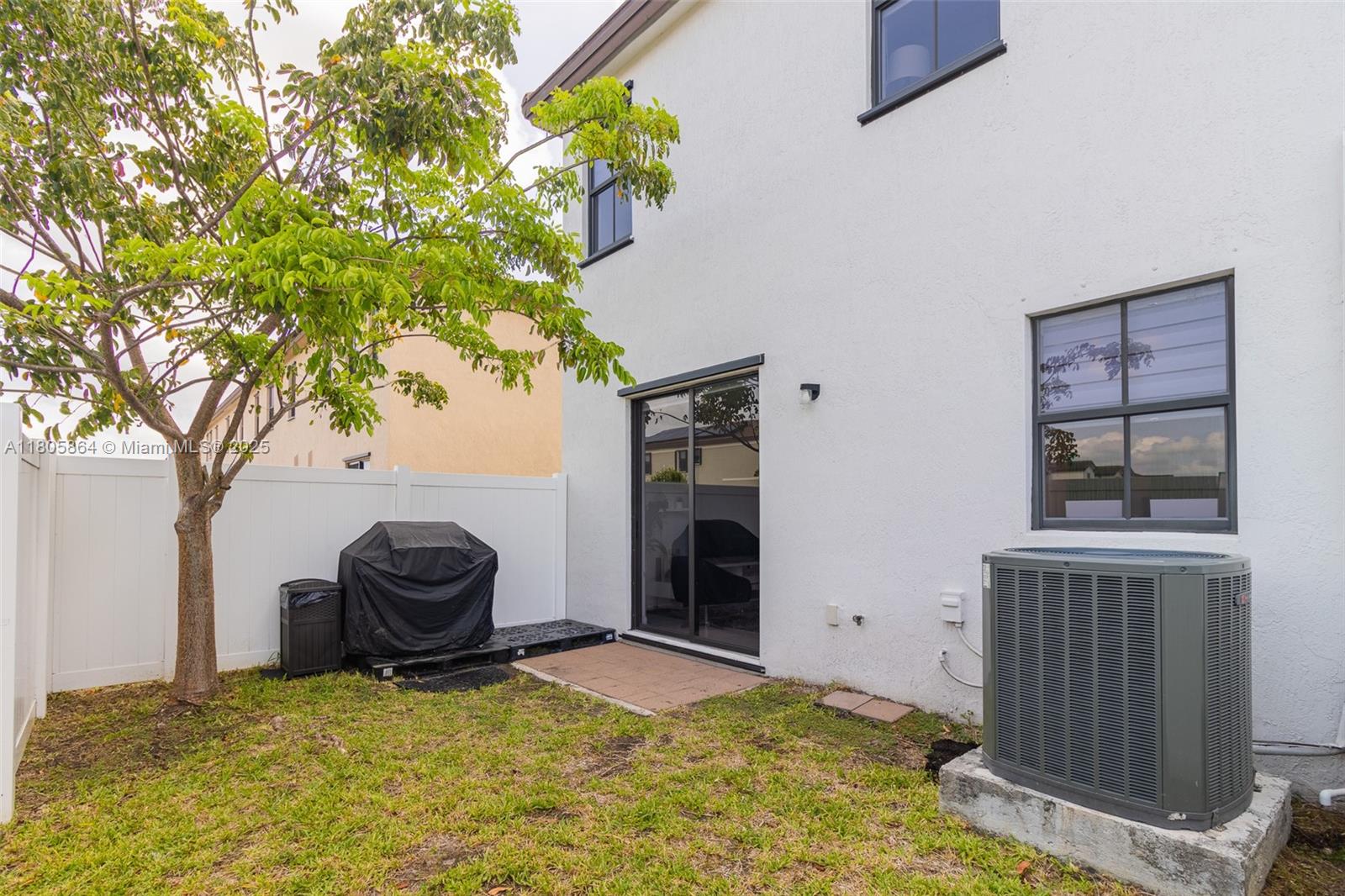 10966 West 33rd Way Hialeah, FL 33018 - Photo 6 of 43 a view of back yard of the house