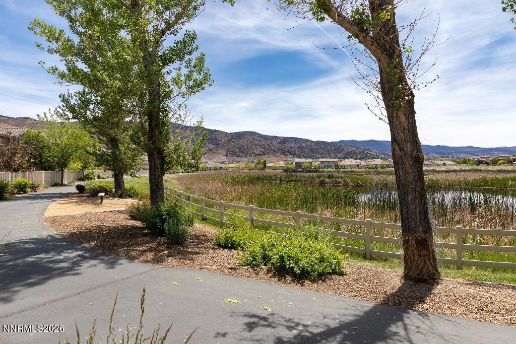 1864 Wind Ranch Road, Unit B Reno, NV 89521 - Photo 35 of 42 a view of a lake with a mountain view