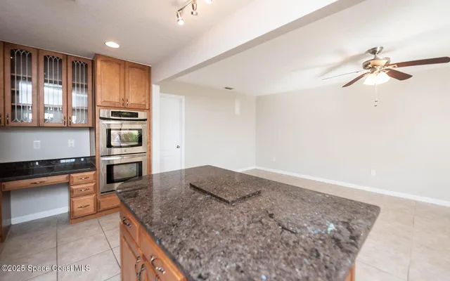 a view of empty room with windows